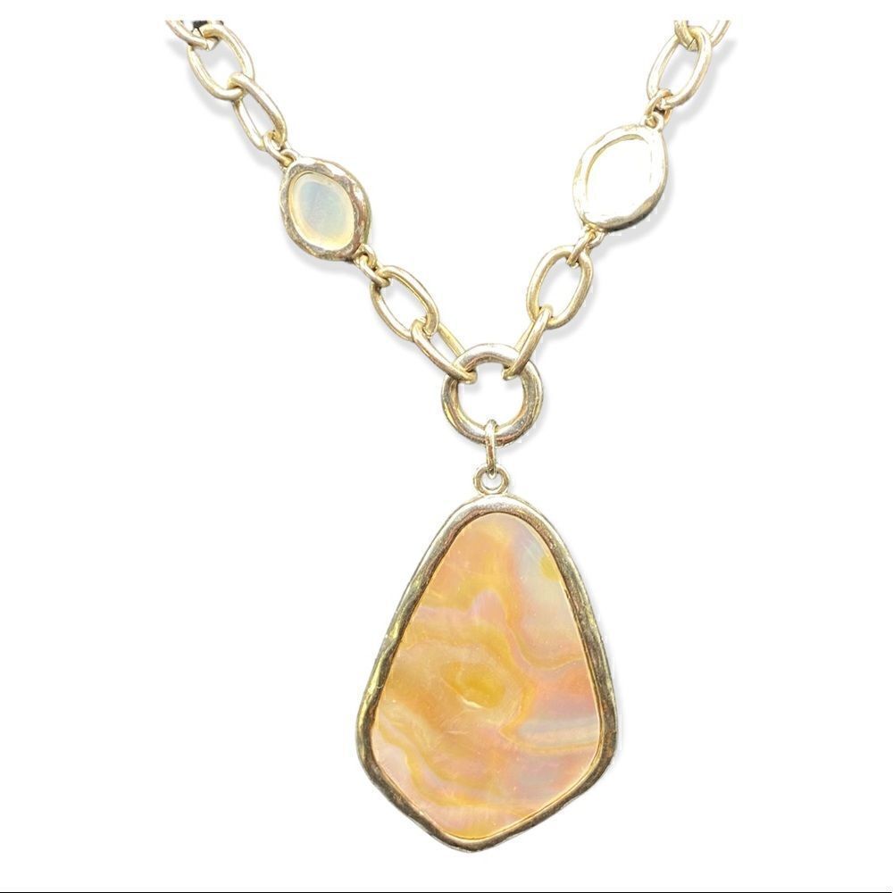 Silver tone mother of pearl drop necklace with small accent pieces adjustable